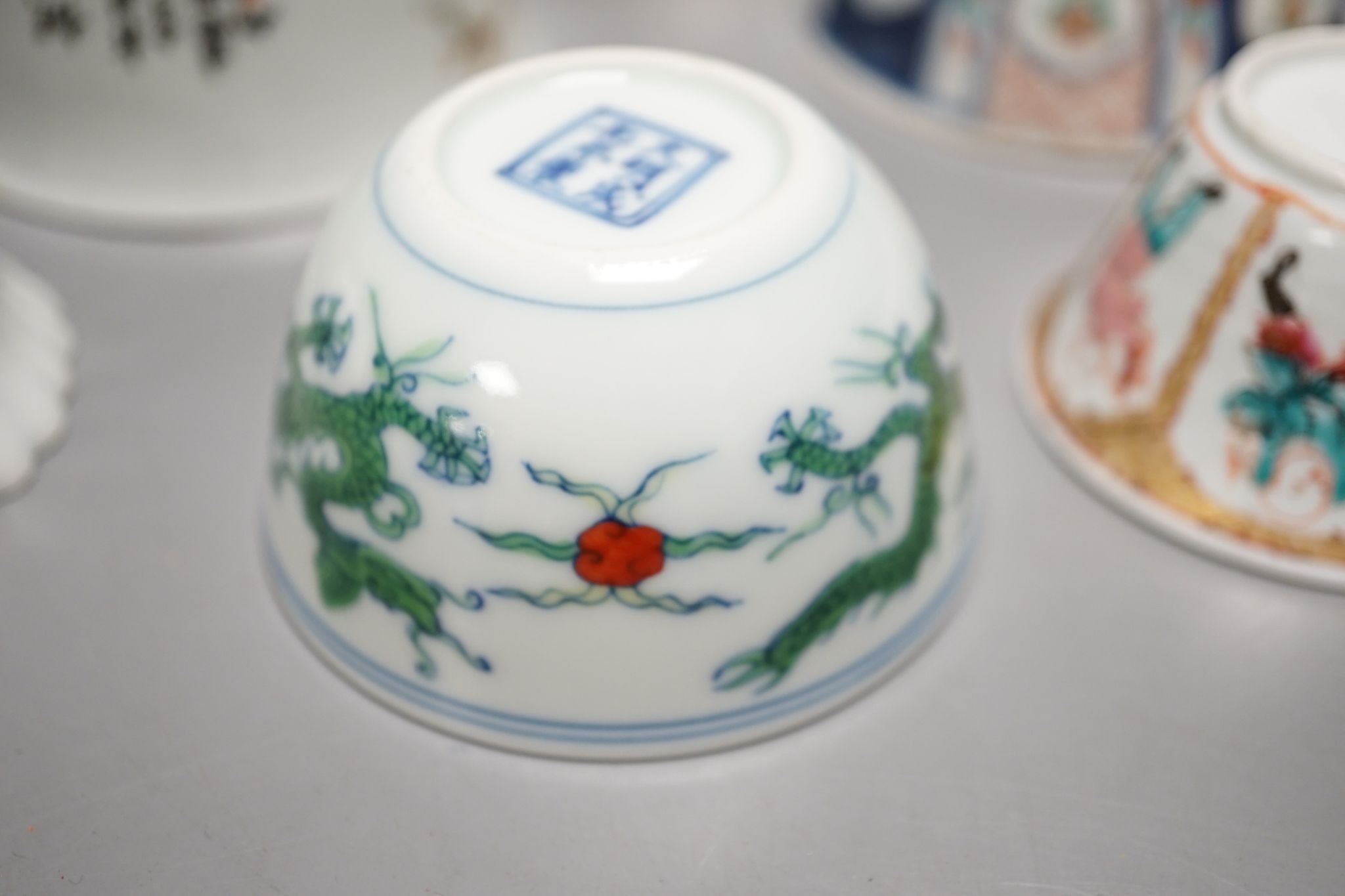 Nine Chinese porcelain tea bowls, tallest 6 cm.